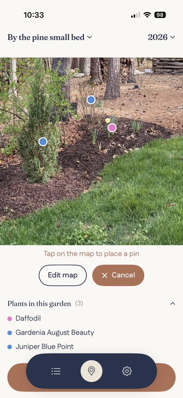 BloomMap showing plants mapped on a garden photo